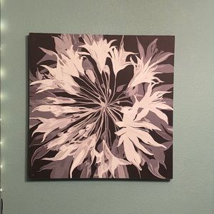 Hanging art with nail hook in the back